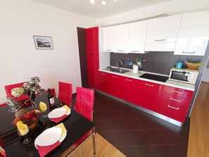 Kitchen area. Kitchen + dining area