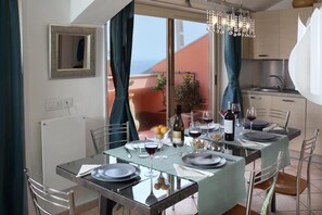 dining area with views the historic city center of Taormina and the Mediterranean