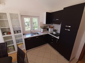 Kitchen area. Kitchen + living room