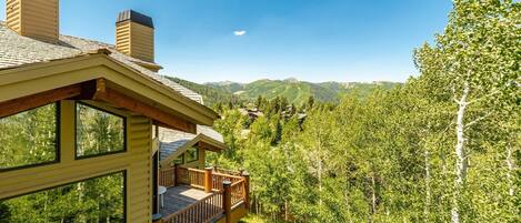 Upper deck off great room with clear views toward Deer Valley ski runs. Not pictured: natural gas firepit table, carved redwood lounge chairs, gas BBQ.