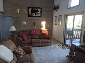 Living room. Each couch has two recliners.