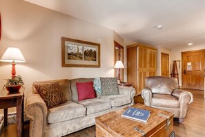 Spacious living room with sofa sleeper