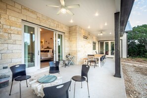 Large covered patio with outdoor dining area