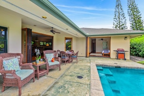 Relax and unwind under the covered courtyard and pool area.