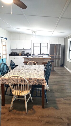 Full kitchen and dining area