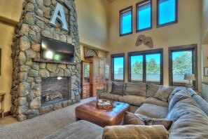 Vaulted main floor Living Room ceiling, 42" TV.