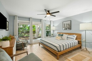 Master Bedroom Suite with Flat Screen Smart TV and Access to Private Covered Patio via Sliders (King Bed)