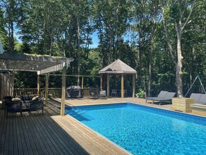 Lounge set, sun loungers, dining set under pergola and Weber 4 burner grill