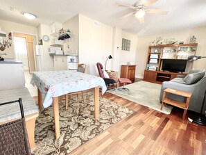 Open design of this 1br condo with great use of space.  Dining table for dining or use while working remotely.