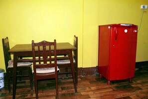 Dining table and refrigerator.
