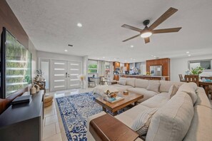 Living room with flat screen TV.... spacious and comfortable with high end finishings.