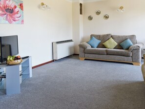 Welcoming living room | Haywain - Trentinney Farm Holiday Cottages, St Endellion, near Port Isaac