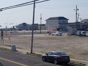 Ocean view from deck. Steps to the ocean and boardwalk.