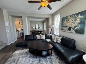 Spacious open-concept living area, perfect for relaxing and unwinding.