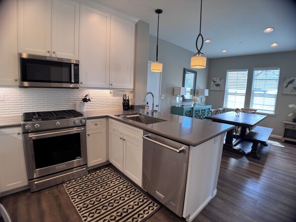 Custom remodeled kitchen is fully equipped for all your culinary adventures.