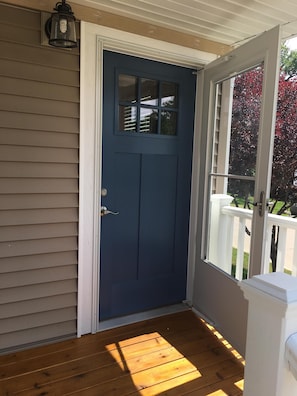 new screen door and aluminum front door