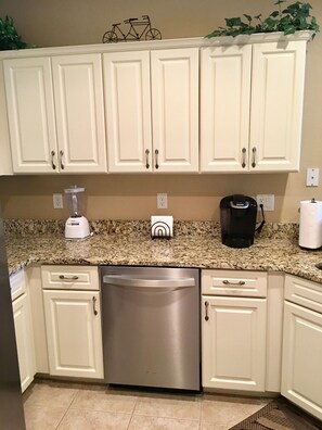 Updated kitchen with granite countertops 