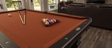 The Terrace Level features full sized pool table, kitchen and living area 