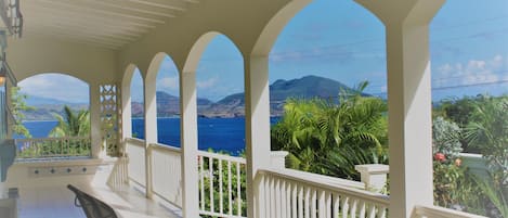 Eden Villa's Great House Entry Gallery.  St Kitts across the Narrows