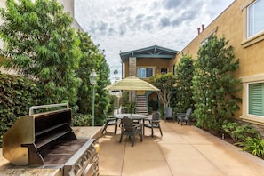 Grill in gated courtyard shared by the nine condos in the complex. 