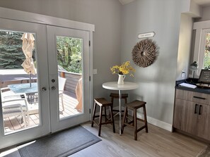 Dining nook and door to balcony/hot tub