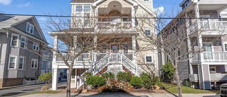 Our house is a 1st floor condo(above garages)with a beautiful wrap around porch