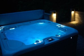 Hydrotherapy spa seats 5 adults and includes Moto-massage lounger.