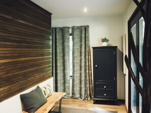 Entry area with live-edge  bench for putting on snow gear or enjoying a coffee.