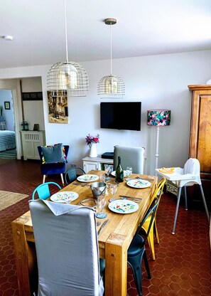 Indoor dining area. Table extends for 8 people. Child’s high chair available.