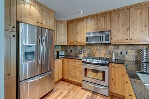 Alder wood kitchen cabinets - lots of storage