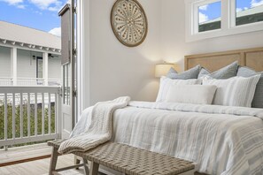 Juliet balcony in king bedroom. Very refreshing and relaxin decor.