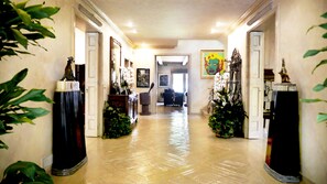 Main entry stunning hallway leading to dining, living room and kitchen.