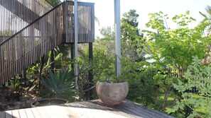 Downstairs garden , safe for families and pets . 
