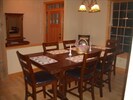 The dining room pub style table with chairs for 12