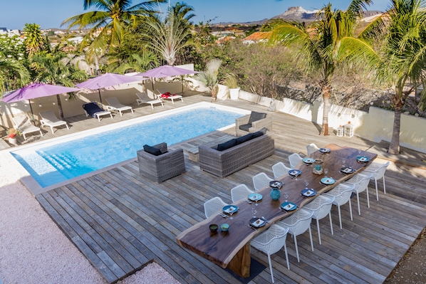 overview pool area and dining table