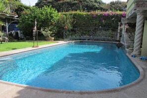 All yours,  Salt Water solar-heated pool. 