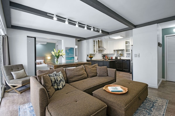 LIVING ROOM: Our Apartment is the perfect homebase for your Waikīkī vacation.