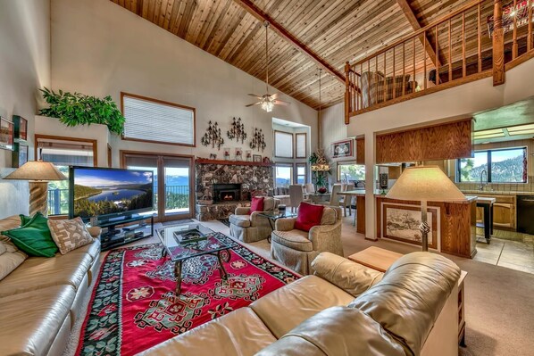 Spacious living area with adjacent kitchen and dining room. And gorgeous views!