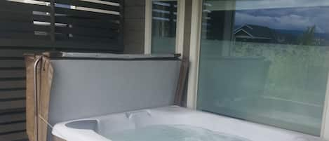 Relax any time of the year, under cover, in our private guest only hot tub. 