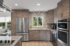 Kitchen with modern streamline cabinets.