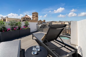 Our rooftop chill-out has views of the church and is a lovely sun trap.