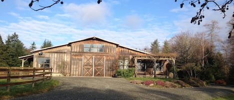 The Coach House is on the right side of the large barn.