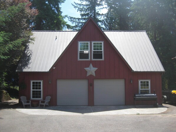 The Carriage House - private entrance on left and plenty of parking.
