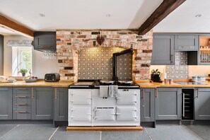 Lanes End Cottage, near Cattistock: The family kitchen complete with Aga