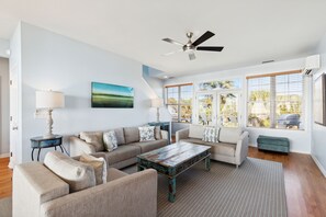 Cozy living area with doors to back porch