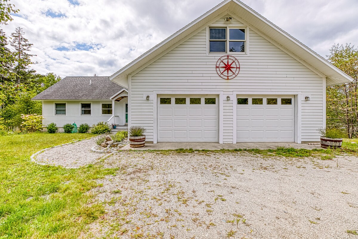 Comfortable bayfront home with beautiful views, large deck & on-site tennis