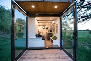 Original container doors swing wide open.