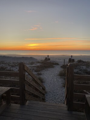 Beach access 1 block away with public shower rinse off area.