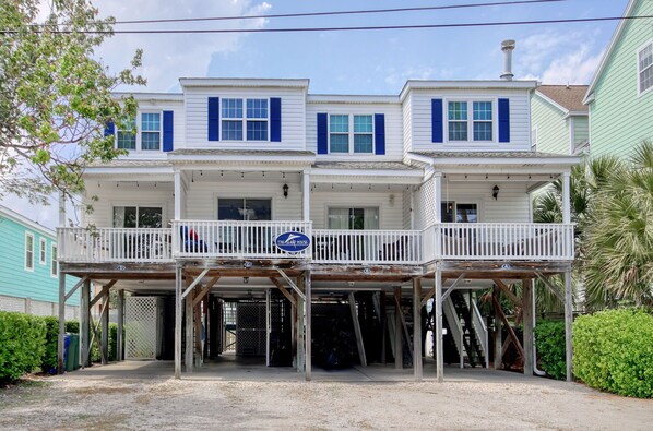 Second townhouse on the left with Island House sign.