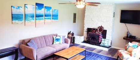 LIVING ROOM - couch, chairs, tv, wifi, place to sit back and relax, ocean decor